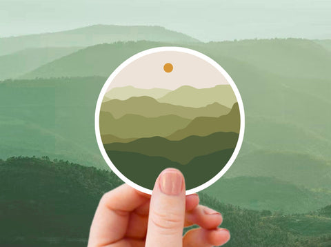 Green Mountain Range Sticker  NATURESCAPE Stickers:  Our one-of-a-kind unique landscape and tallscape decals are designed for ADVENTURERS!  Waterproof, scratch and weather-resistant, you can put these stickers on all of your outdoor gear like your favorite tumbler or water bottle, no matter what the size!  It's like having a window into your favorite nature scene, but the sticker fits easily on your water bottle, laptop, mountain bike frame, or car window.  Place on any smooth surface!