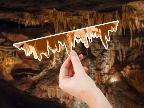Image shows an extra large, 10" long sticker that protrays an underground cave ceiling with cave rocks hanging down and bats flying. Waterproof, scratch and weather-resistant, you can put these stickers on all of your outdoor gear like your favorite tumbler or water bottle, no matter what the size.