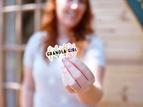  Vinyl sticker with a floral design and the text "granola girl" for your coffee mug, water bottle, laptop, car sticker, journal, window, or other smooth surface.
