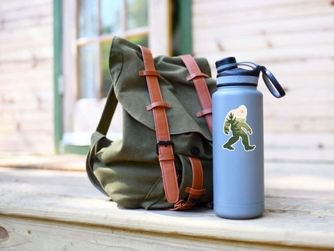 Green & white Sasquatch sticker for your water bottle, laptop, car bumper, journal, window, or other smooth surface.