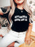 Woman wearing an oversized "Adventure Girls Get It" t-shirt, perfect for your girls trip gifts, best friend shirts, or just the right oversized tee for your summer vibes, road trip aesthetic!