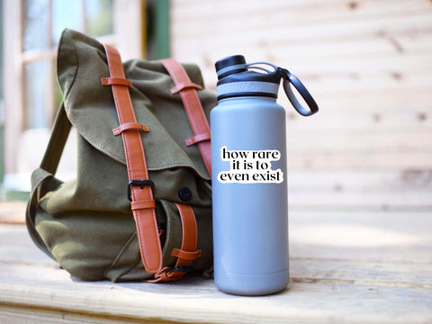 "How rare it is to even exist" poetry sticker for your water bottle, laptop, car sticker, journal, window, or other smooth surface.  Perfect for personalizing your belongings with an aesthetic quote sticker, reminding you that every day is a gift.