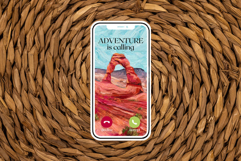 "Adventure is Calling" nature desert vinyl sticker for your water bottle, laptop, car sticker, journal, window, or other smooth surface.  Perfect for personalizing your belongings or as a gift for someone who loves traveling, camping, or hiking in the desert or at Arches National Park in Utah.